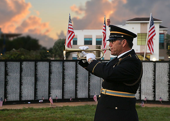 Eugene Russell playing a trumpet